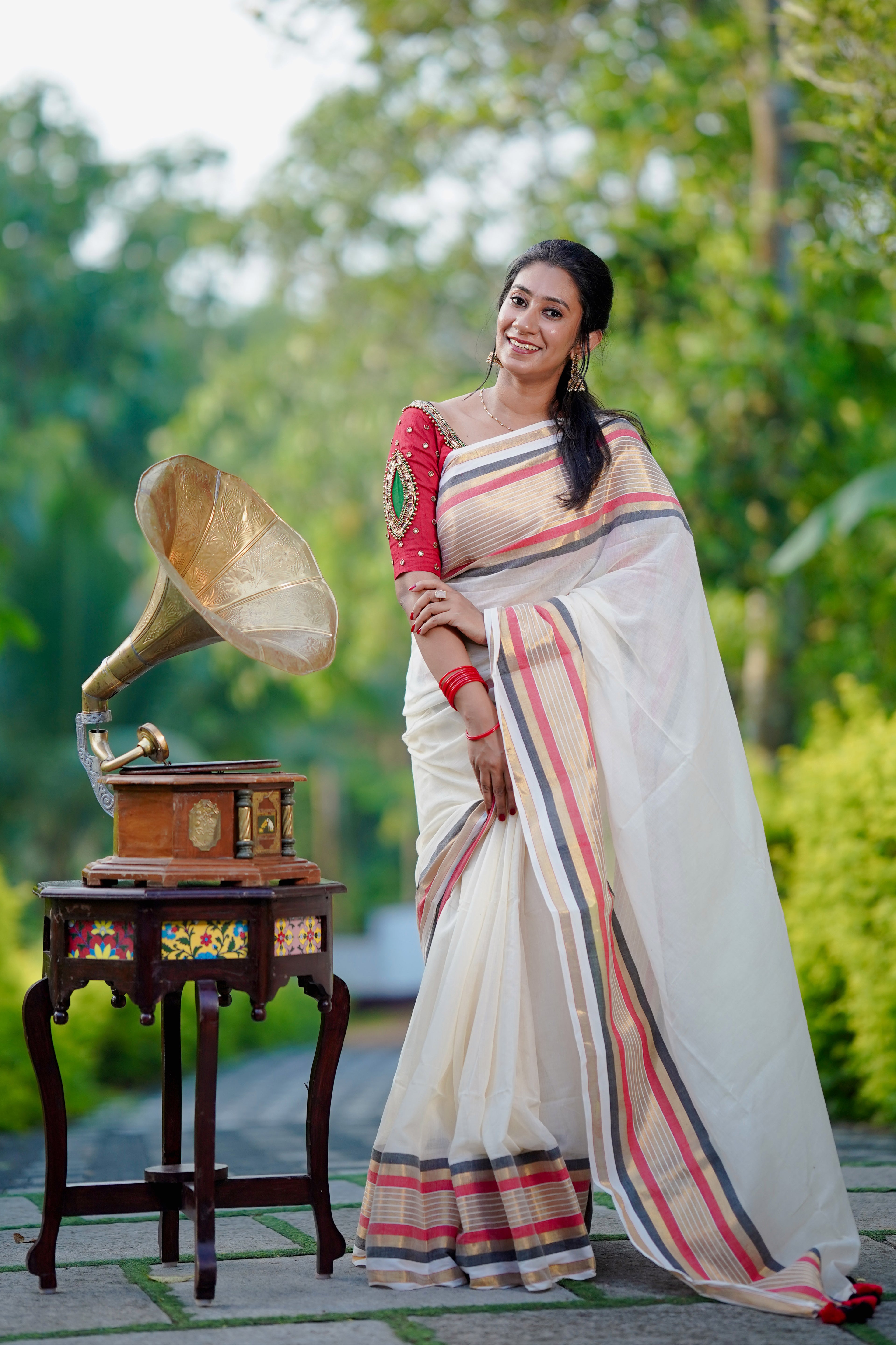 Black, Gold, and Red Borders Saree